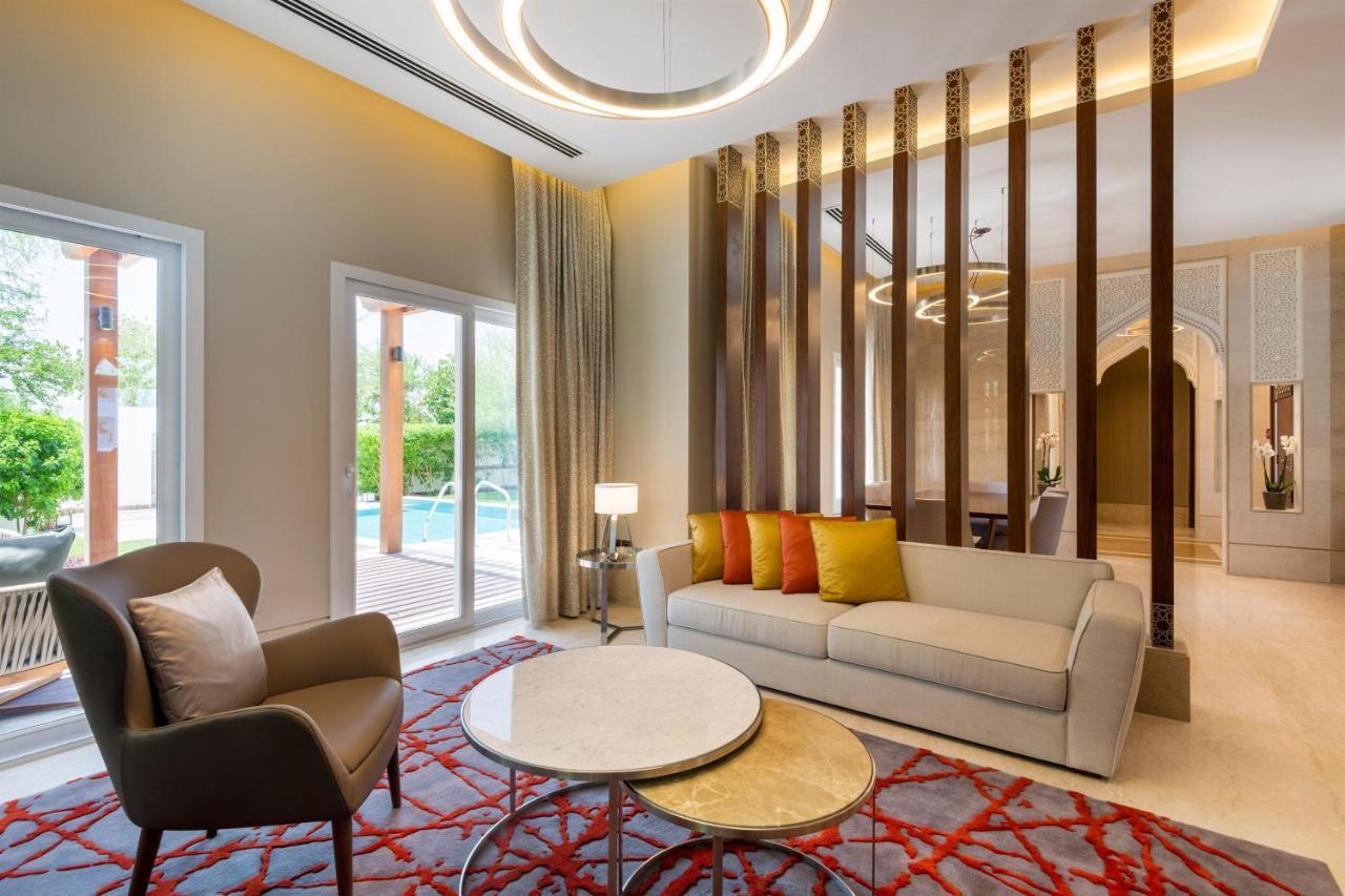 Al Messila, A Luxury Collection Resort & Spa, Doha Exteriör bild A living room at the hotel